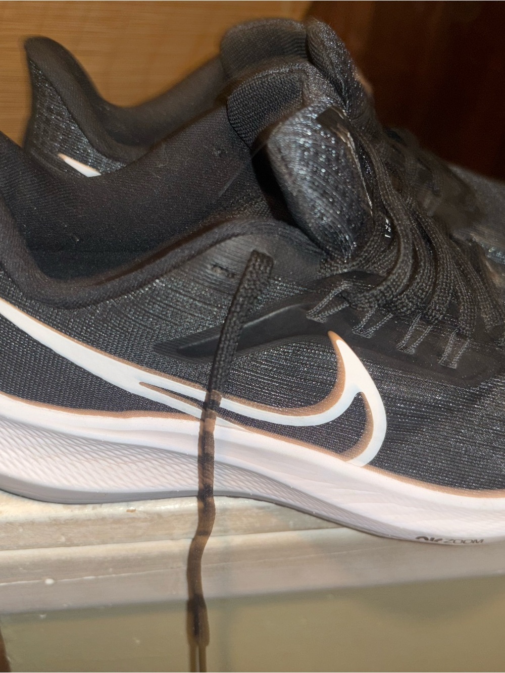 Nike Women’s Black with White Swoosh Athletic Sneakers